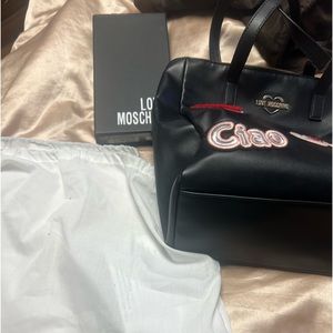 Like new with wallet box and dust bag